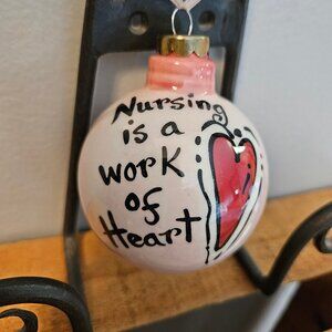 Nola Watkins 'Nursing is a Work of Heart' Ceramic Ornament